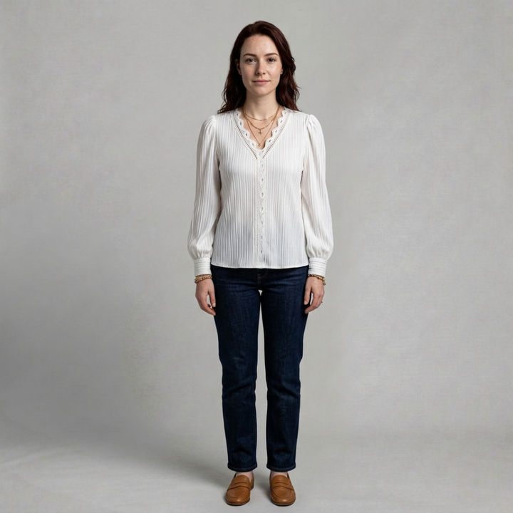 Clara – Elegant pleated blouse with delicate lace trim