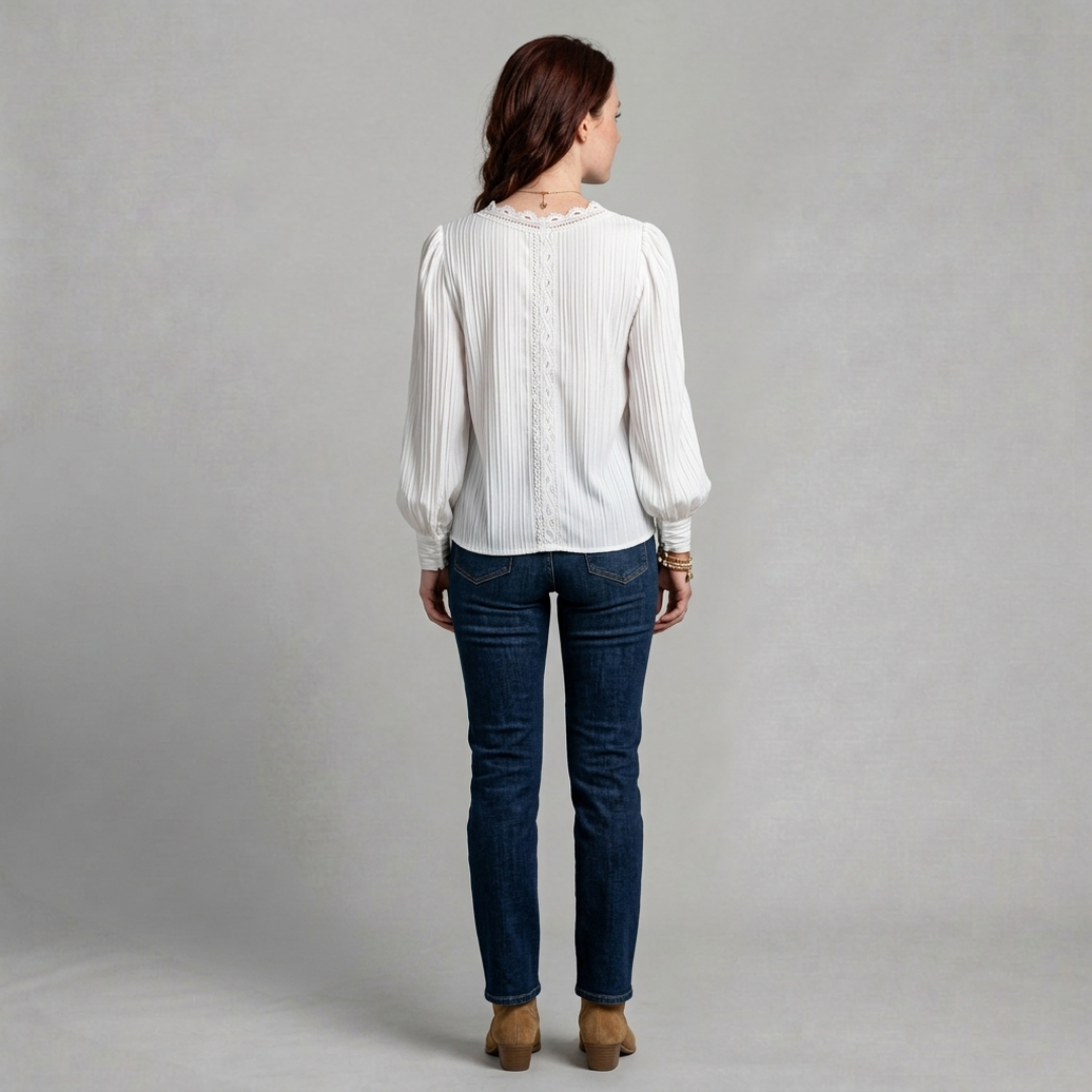 Clara – Elegant pleated blouse with delicate lace trim