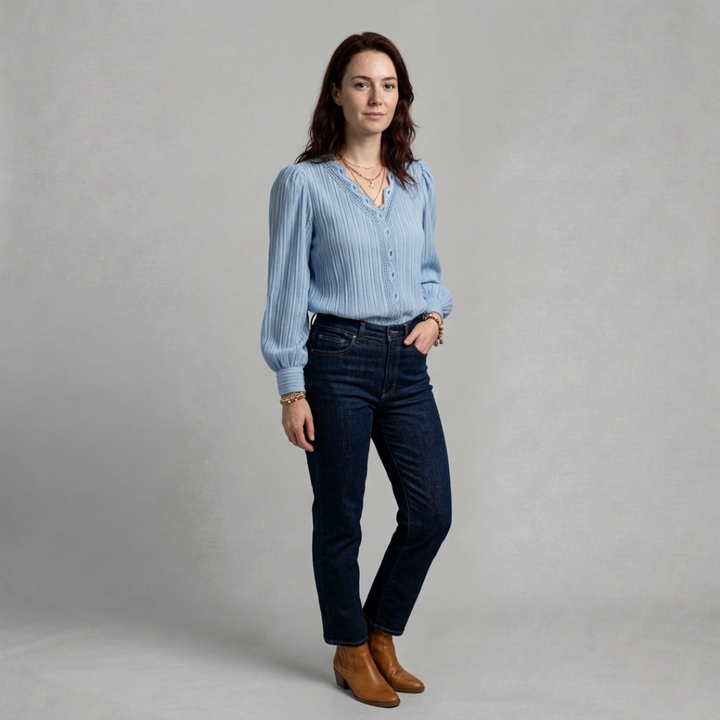Clara – Elegant pleated blouse with delicate lace trim